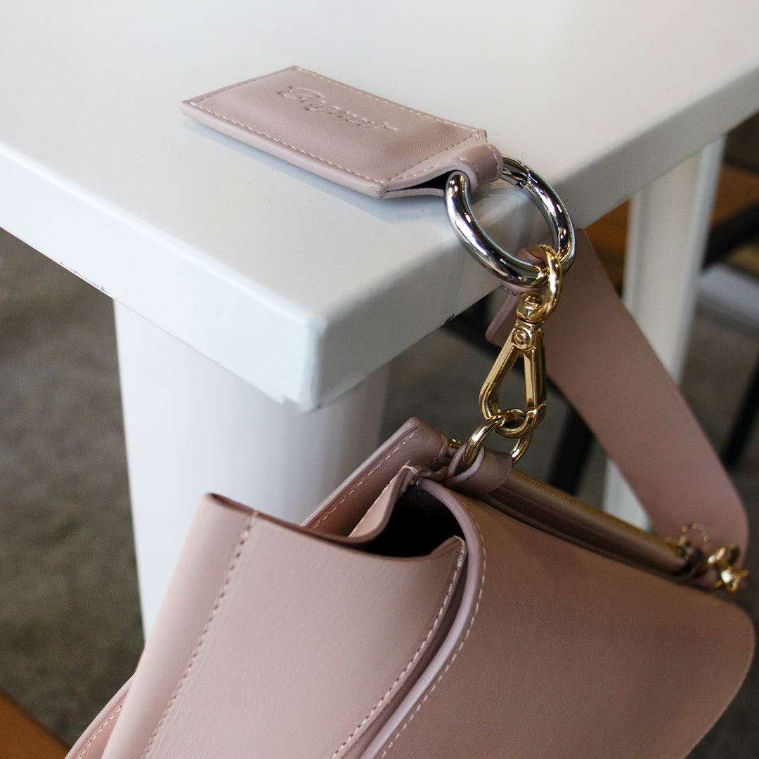 Bagnet magnetic purse holder for restroom stalls table tops